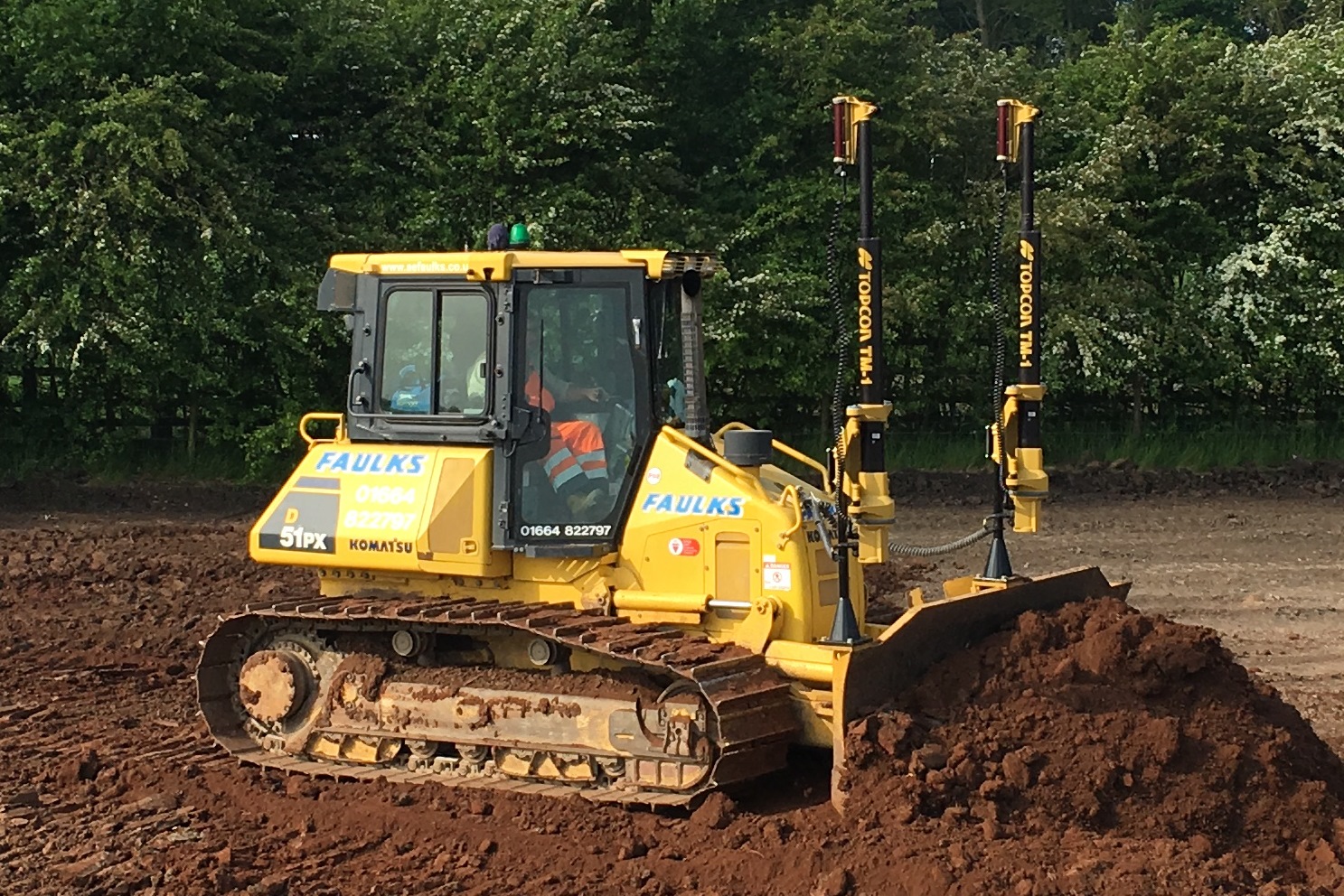 The D51 Dozer available to hire from AE Faulks in use on construction site.