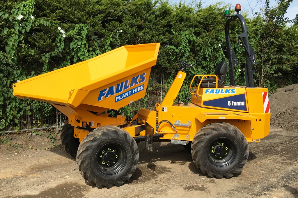 Thwaites 6t Dumper in front of bushes on road side