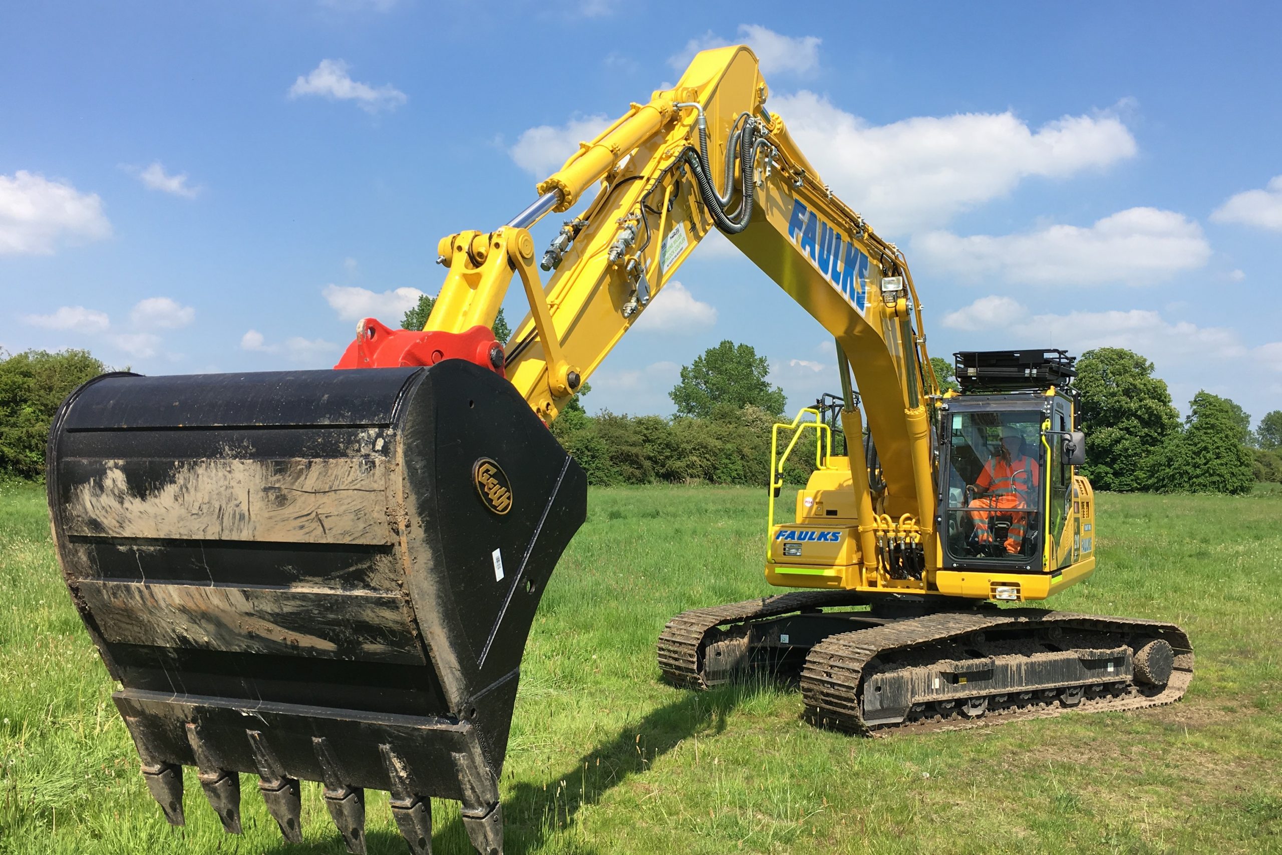 Yellow excavator available for plant hire in Nottinghamshire