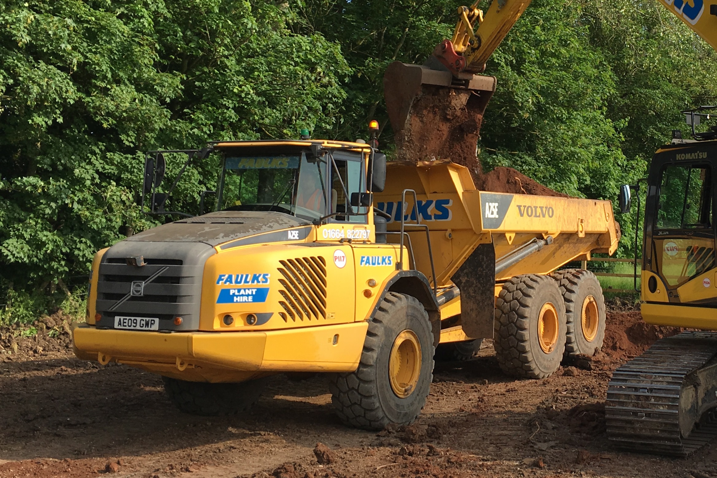 A Volvo A25E dump truck hired from AE Faulks being filled with excavated soil