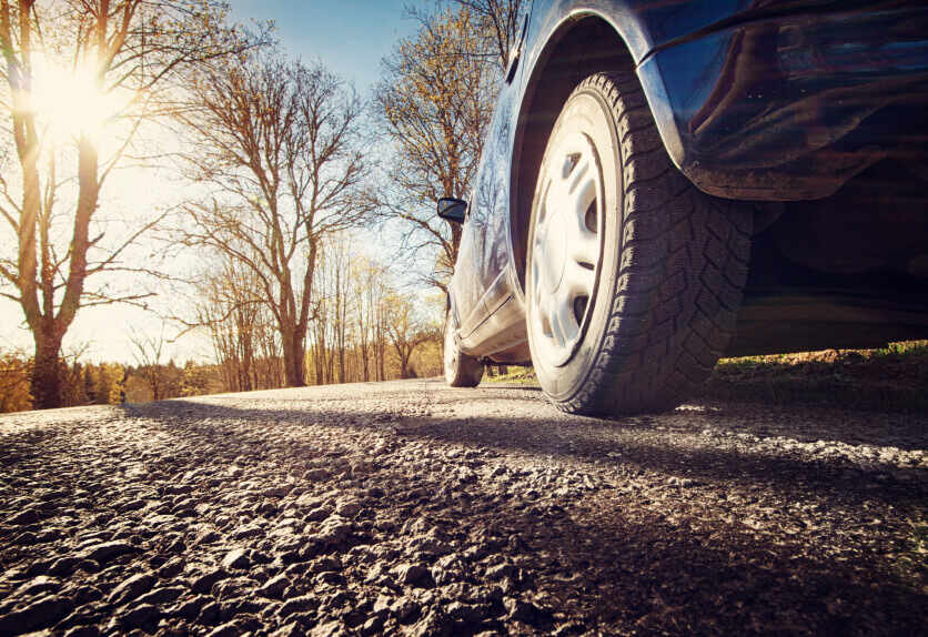 Car on asphalt road in the morning