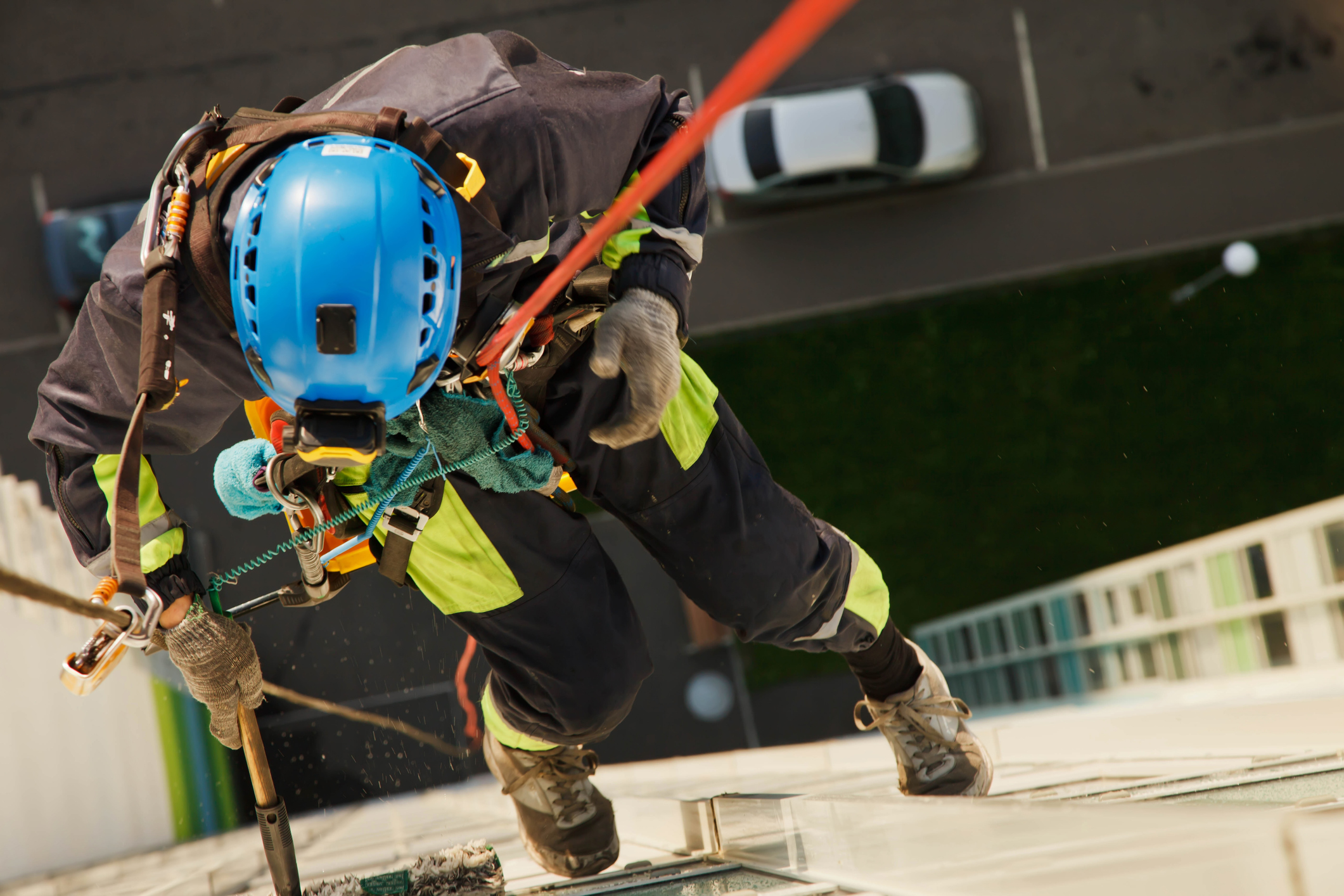 men working in the high with harness