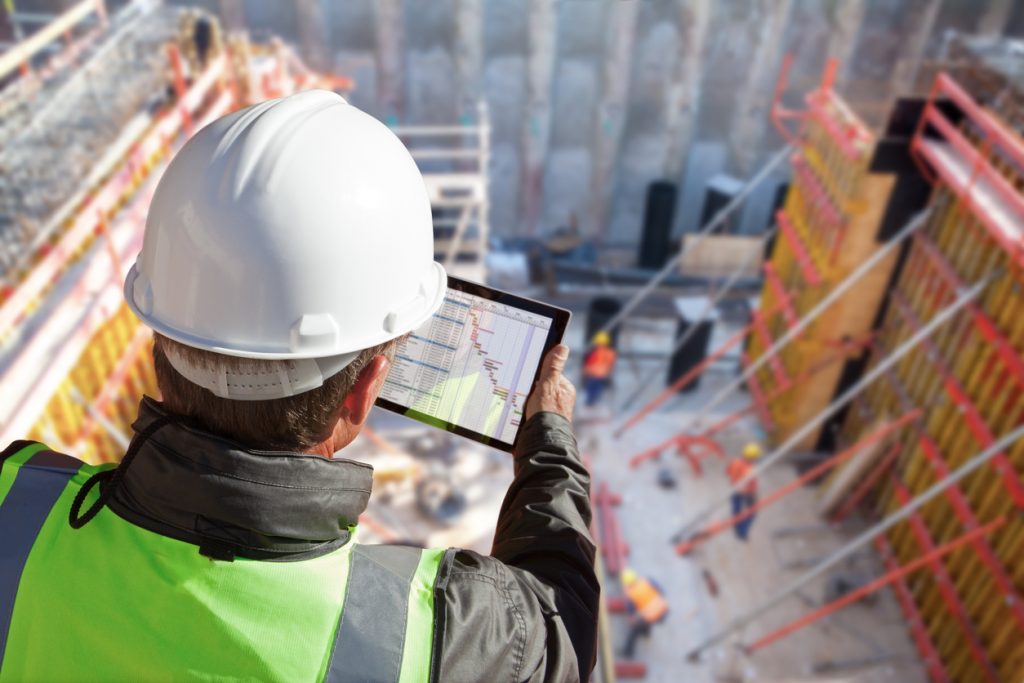 Construction worker with iPad