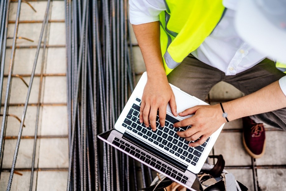 Workman on laptop