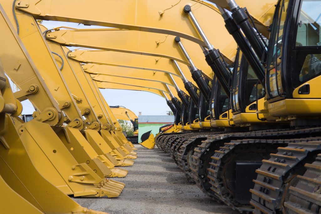 row of excavators